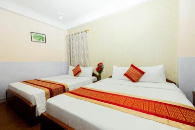 Chambre familiale — Vuon Tao Dan Hotel - Trung Tâm Thành Phố Gần Chợ Bến Thành